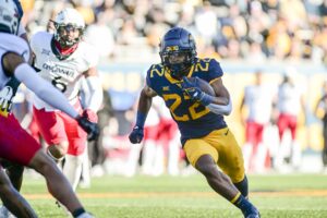 WVU's offense dominates as Mountaineers roll Bearcats 42-21 on Senior Day